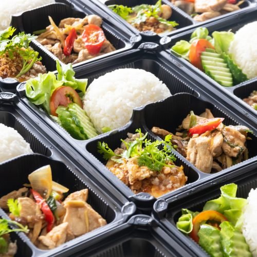 Ready to eat asian rice box, Modern Thai food in take away plastic boxes.